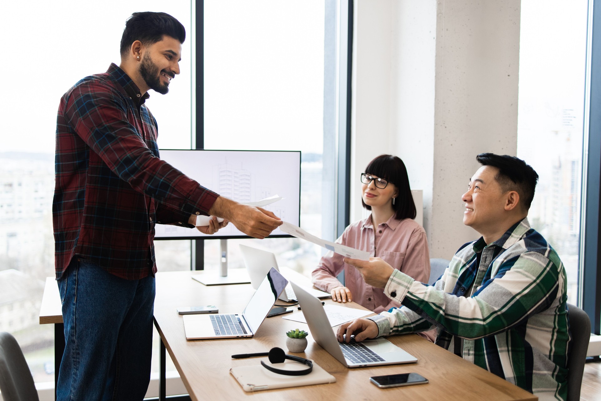 Business meeting with real estate agents in modern office